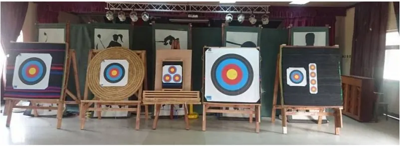 Archery targets set up in an indoor hall