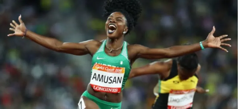 Tobi Amusan celebrating after a hurdles win