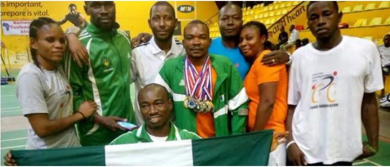 Nigerian players celebrating with medals