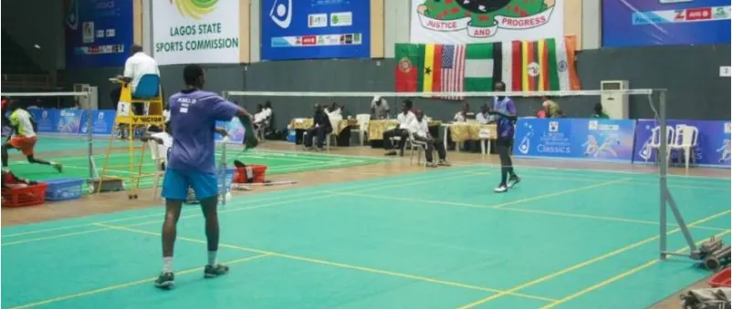 A badminton player serving at a Lagos State tournament