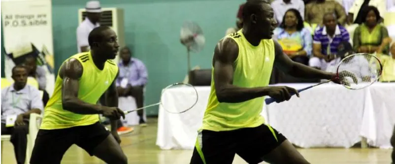 Nigerian doubles pair in yellow in action