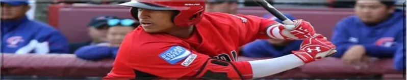A baseball batter in red