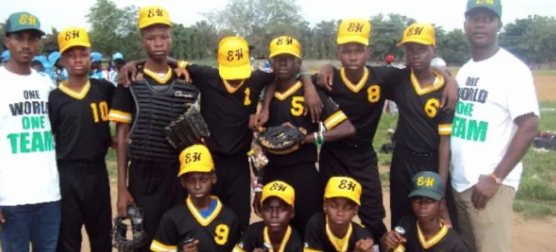 A Nigerian youth baseball team with coaches
