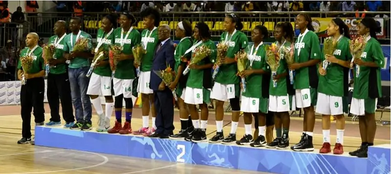 Nigeria’s players line up with their medals