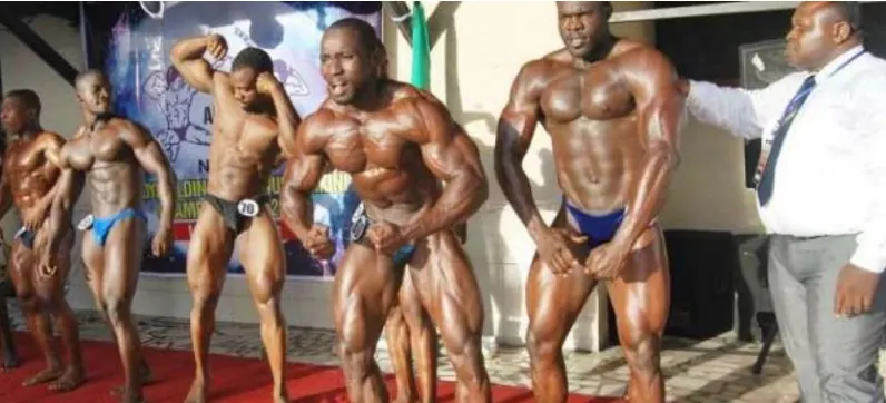 Nigerian bodybuilders posing at a contest