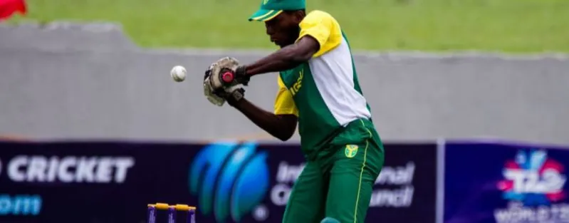 A Nigerian wicketkeeper taking the ball at an ICC qualifier