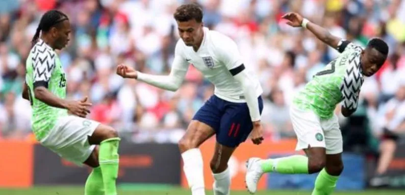 Super Eagles players challenging England players in a 2018 friendly