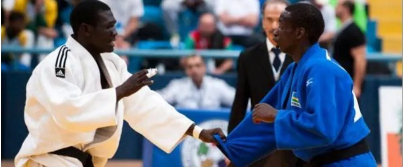 Two judokas gripping in international competition