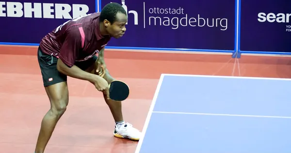Quadri Aruna preparing to serve