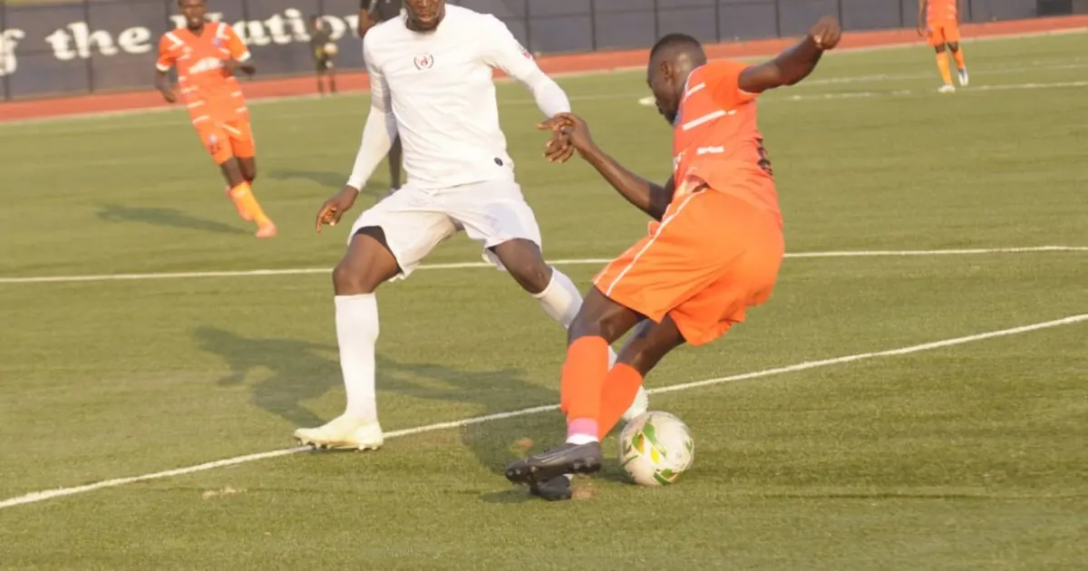 Enugu Rangers and Akwa United players competing for the ball in a league match
