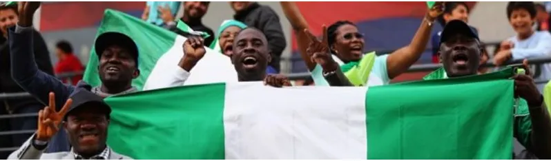 Nigerian supporters with the national flag at the Olympics