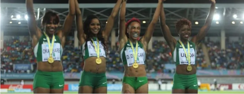 Nigeria’s women’s relay team celebrating with gold medals