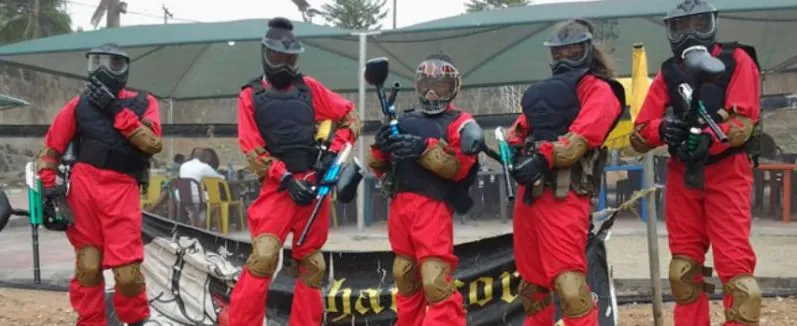 A group of players in red overalls ready for a game