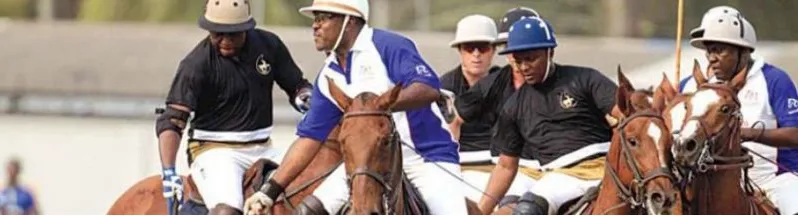Polo players riding side by side