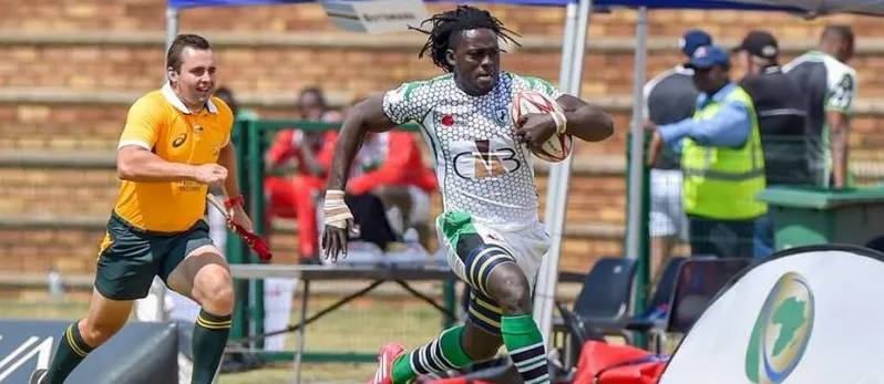 A Nigerian winger running with the ball at an African sevens tournament