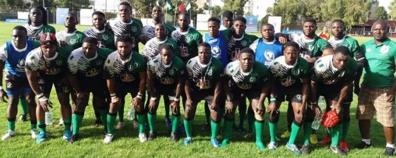 A Nigerian rugby squad with coaches and officials