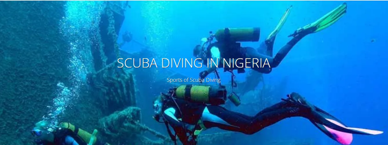 Scuba divers exploring a shipwreck
