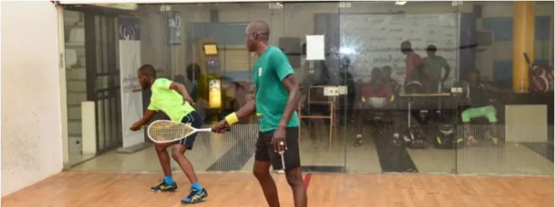 Two Nigerian players in a rally at a Lagos tournament
