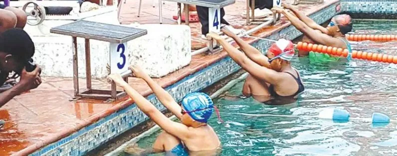 Backstroke swimmers ready to start a race in Nigeria