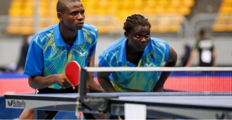 Nigerian mixed doubles players at the table